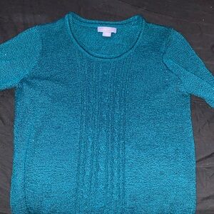 Cute Laura, Scott sweater, very modern